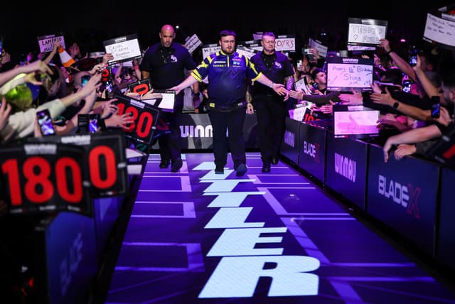 Luke Littler Channels Wayne Rooney as World Champion Learns to Live with the Boos