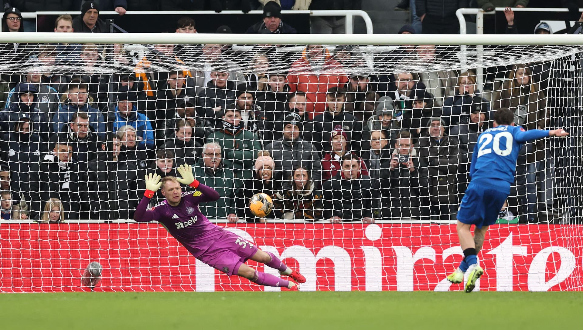 Aaron Ramsdale of Newcastle United saves the fourth penalty from Alex Jimenez