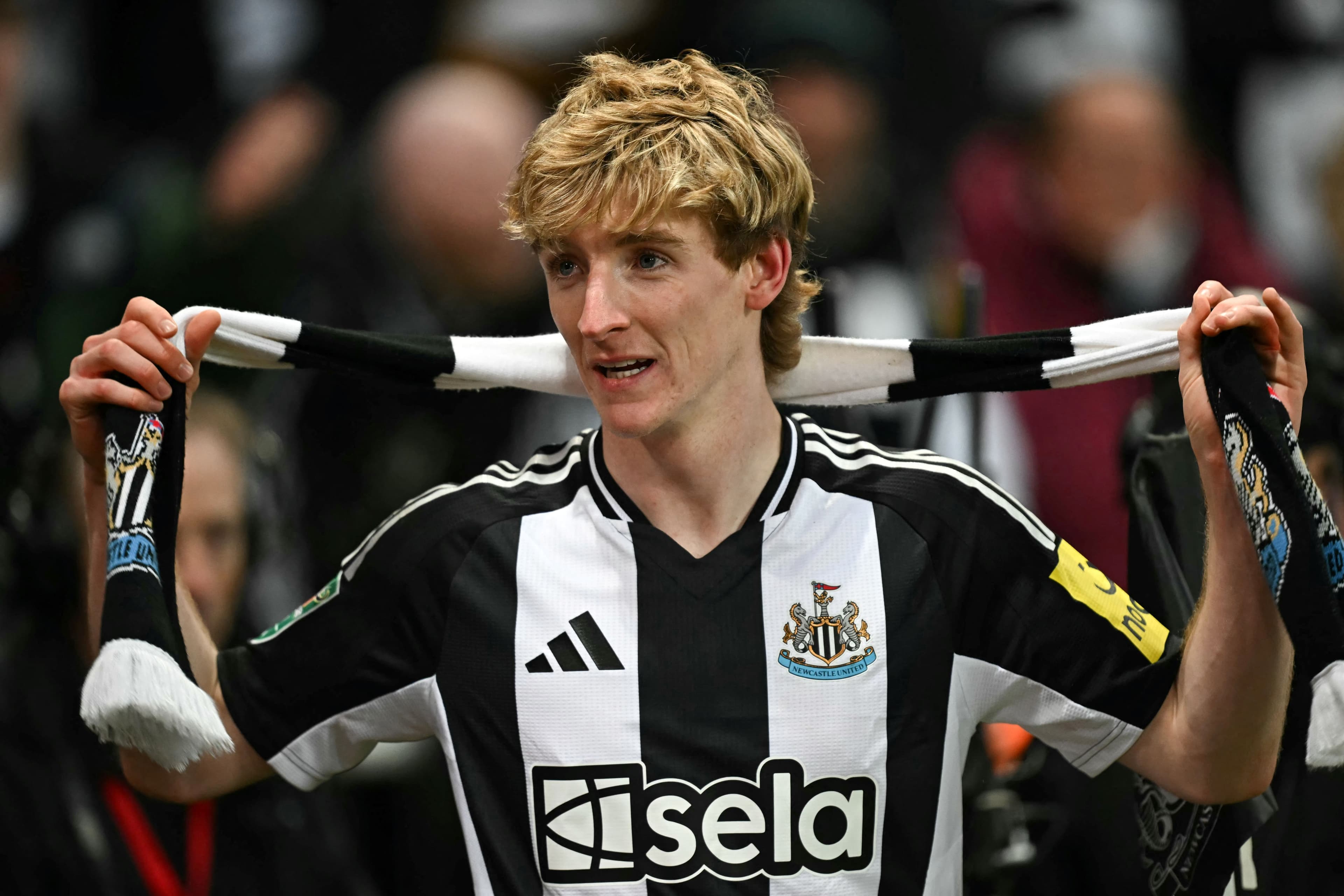 Anthony Gordon celebrates after scoring his team second goal