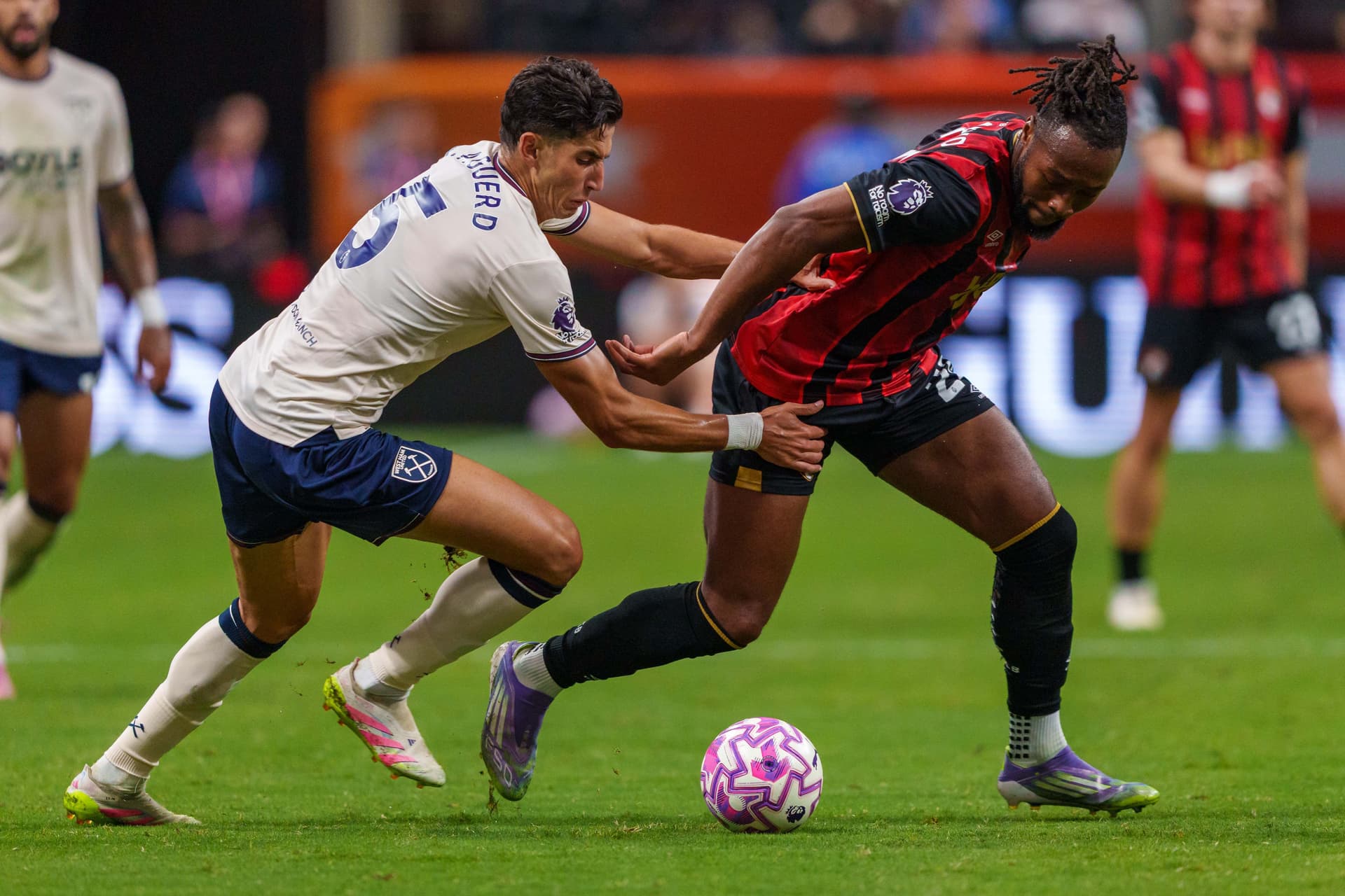 Antoine Semenyo #24 of Bournemouth dribbles the ball as Nayef Aguerd #5 of West Ham United defends