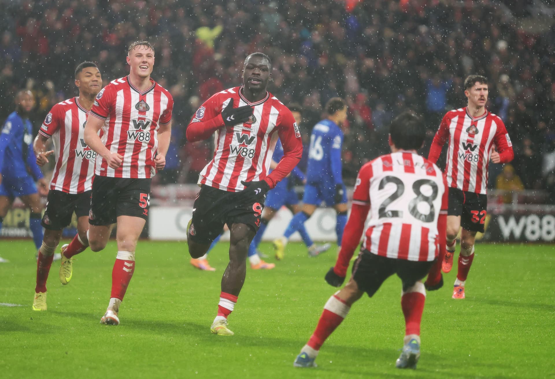 Brian Brobbey celebrates with teammates after scoring during the Premier League match