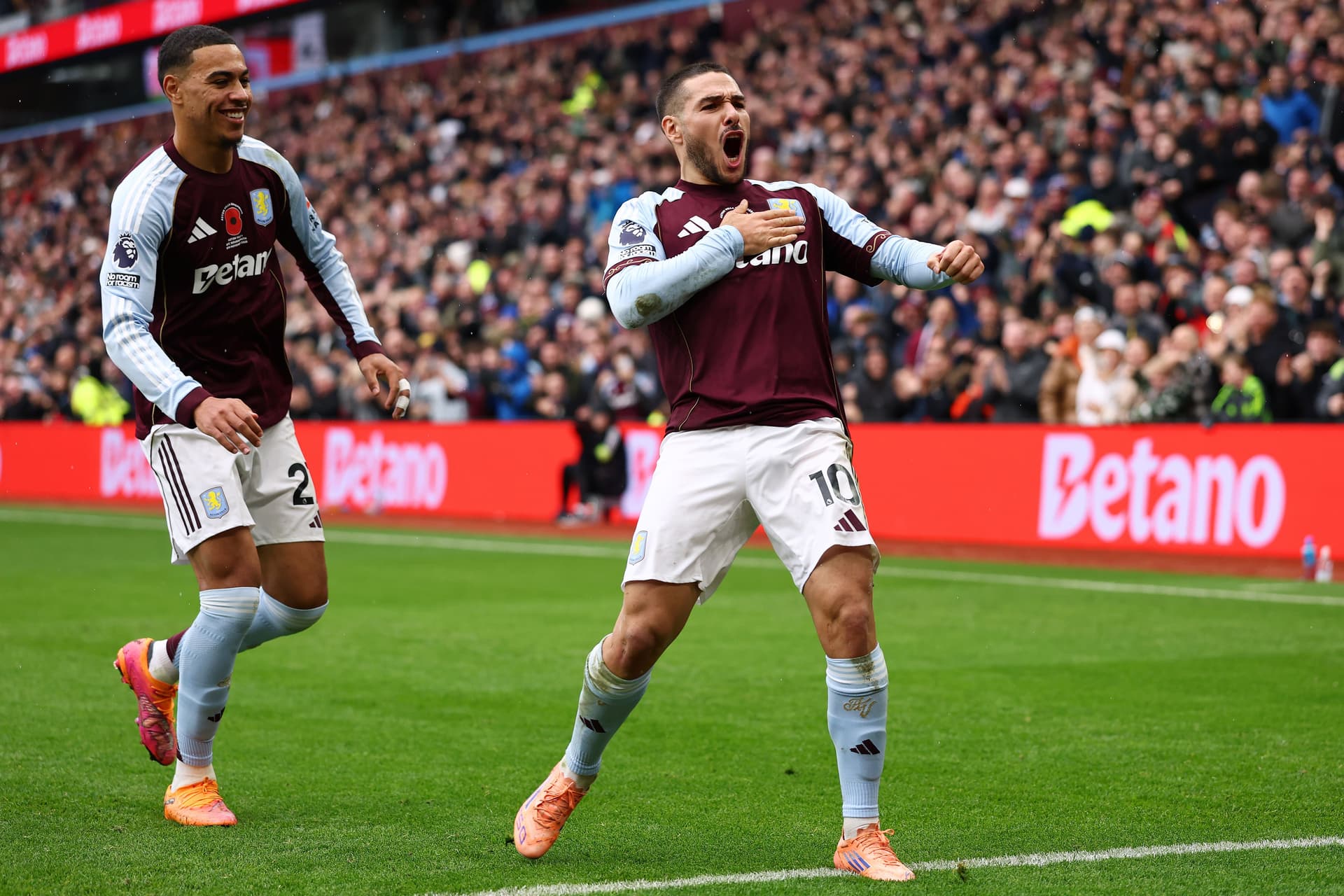 Emiliano Buendia of Aston Villa celebrates with team-mates