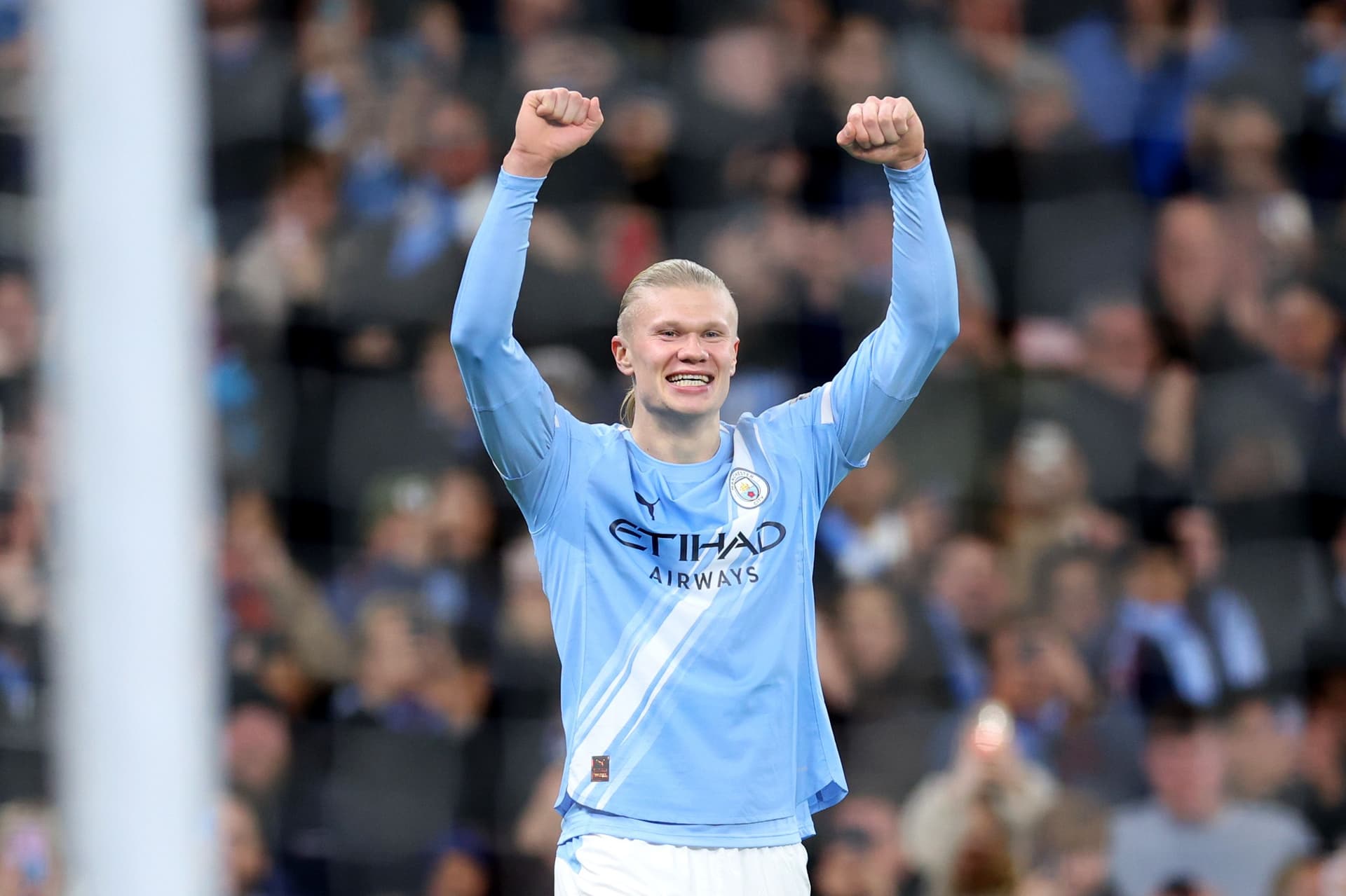 Erling Haaland of Manchester City celebrates scoring his team's third goal during