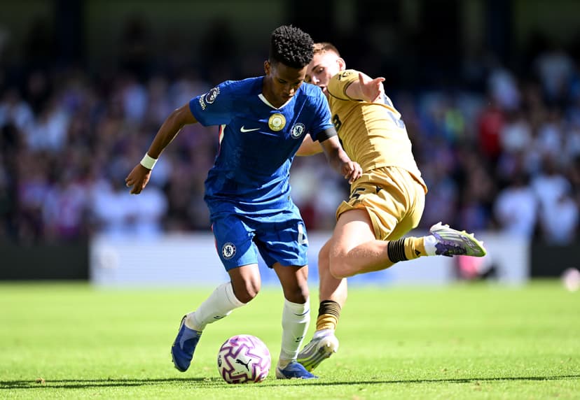 Estevao of Chelsea is challenged by Justin Devenny of Crystal Palace