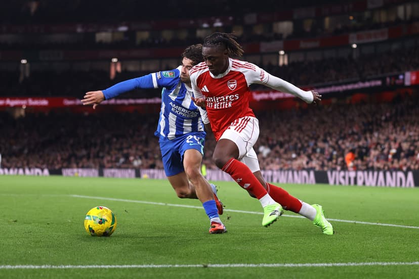 Ferdi Kadioglu of Brighton & Hove Albion and Eberechi Eze of Arsenal