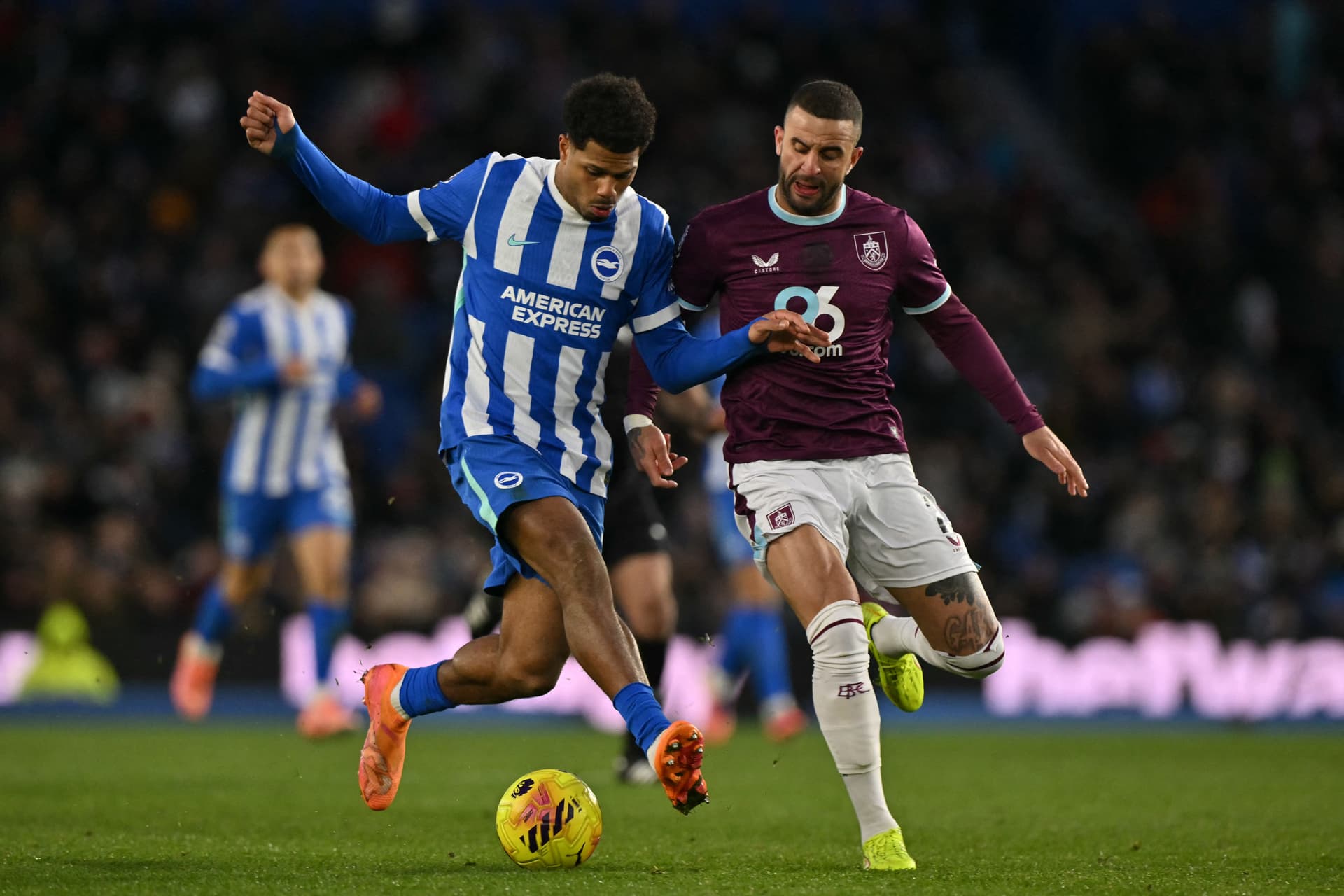 Georginio Rutter (L) tries to hold off Burnley's English defender Kyle Walker.jpg