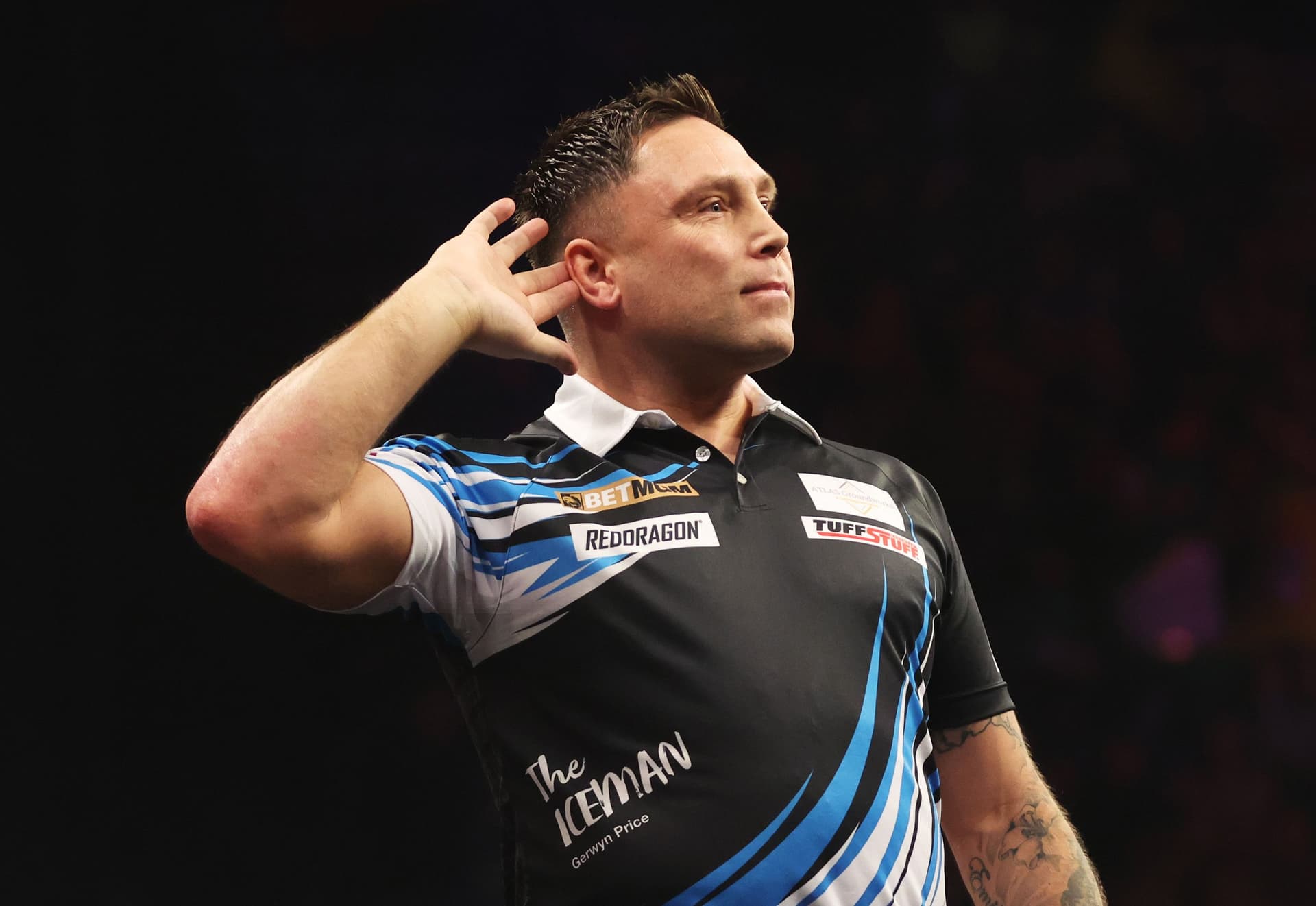 Gerwyn Price of Wales celebrates victory over Stephen Bunting of England