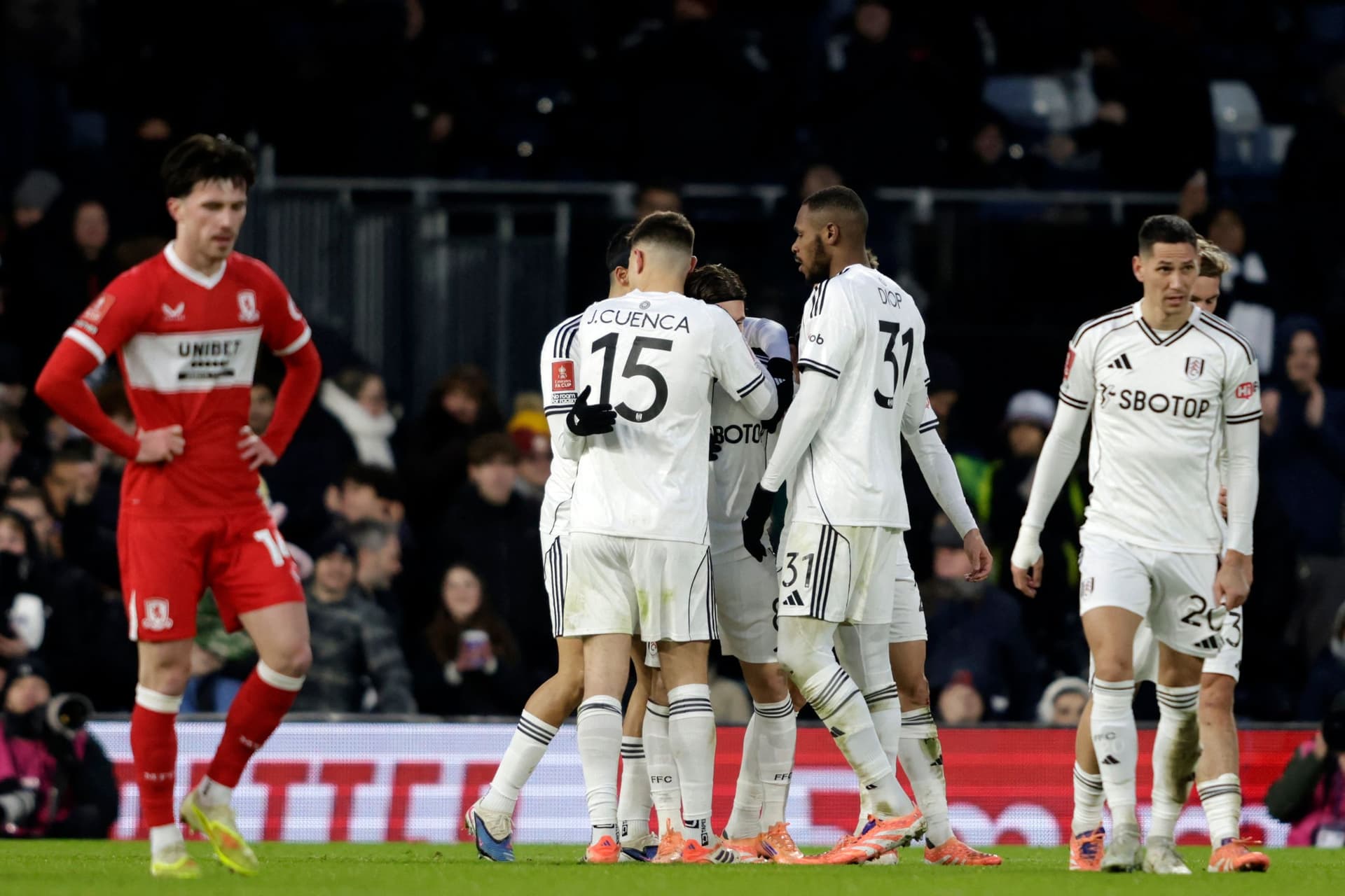 Harry Wilson (C) celebrates with teammates after scoring their first goal