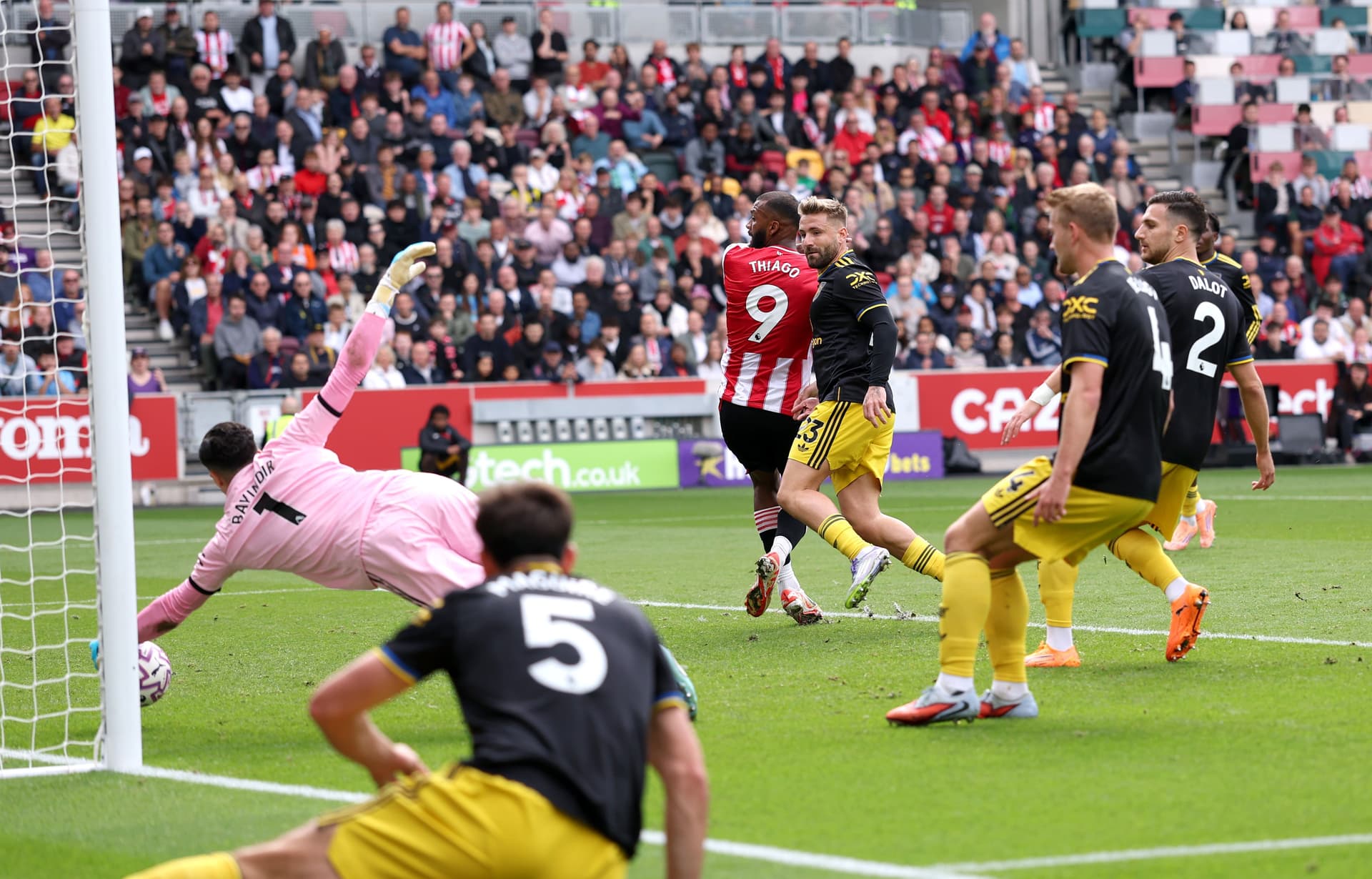 Igor Thiago of Brentford scores his team's second goal past Altay Bayindir