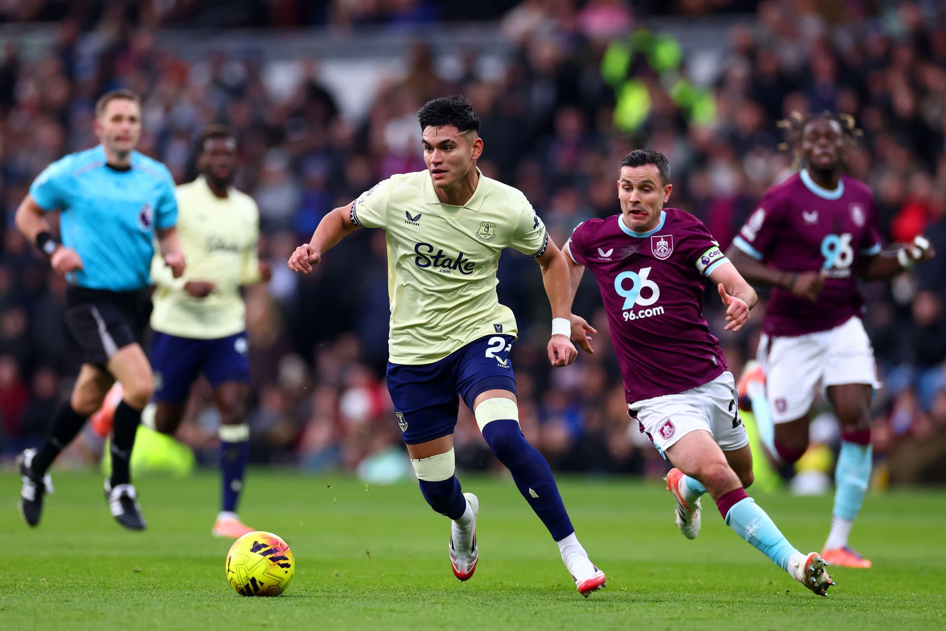 Josh Cullen of Burnley in action with Charly Alcaraz of Everton