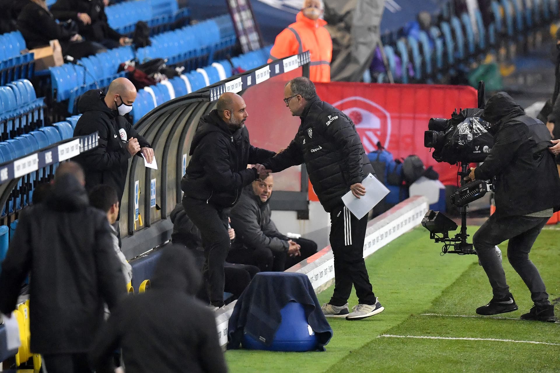 Marcelo Bielsa, Manager of Leeds United greets Pep Guardiola, Manager of Manchester City prior to the Premier League match