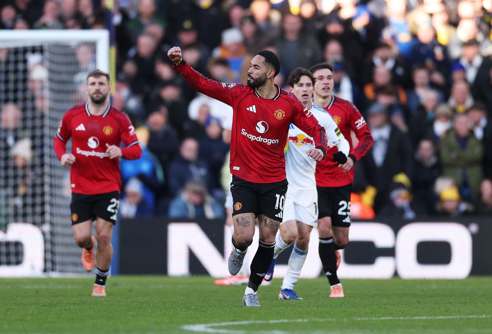 Matheus Cunha of Manchester United celebrates scoring his team's first goal