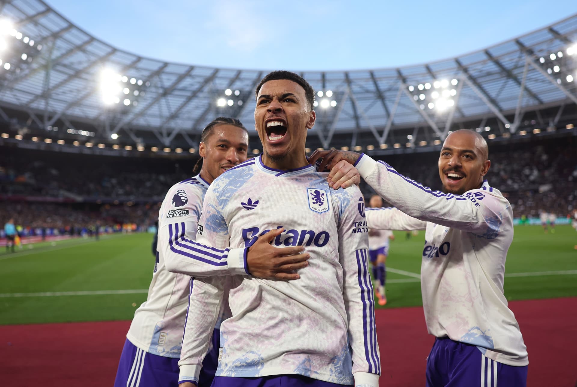 Morgan Rogers of Aston Villa celebrates scoring his team's third goal with teammates