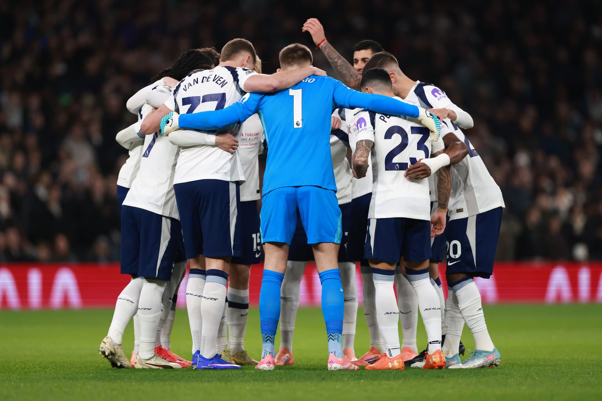 Tottenham Hotspur players huddle during the Premier League