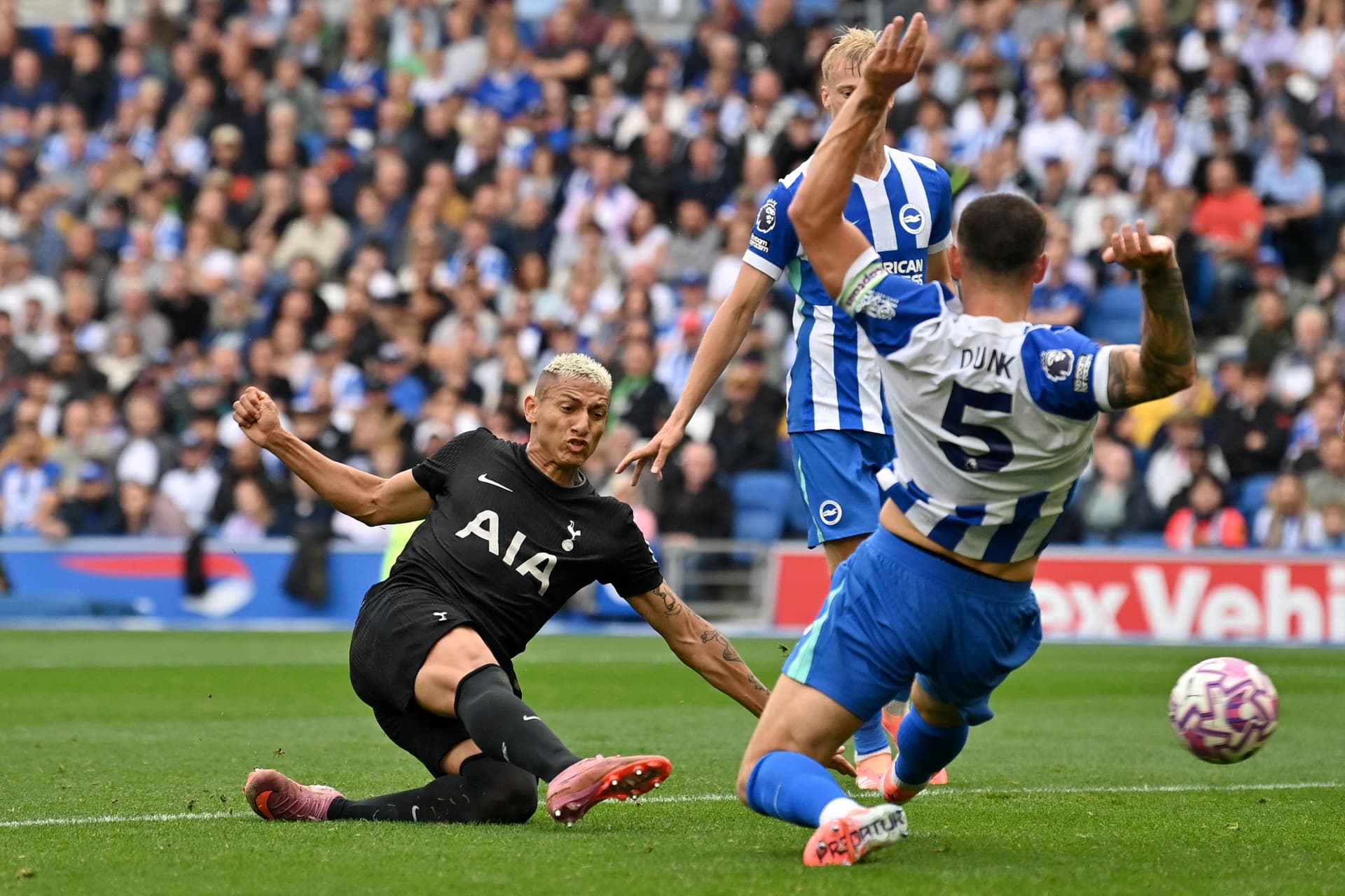 Tottenham Hotspur's Brazilian striker #09 Richarlison scores the team's first goal during the English Premier League football match