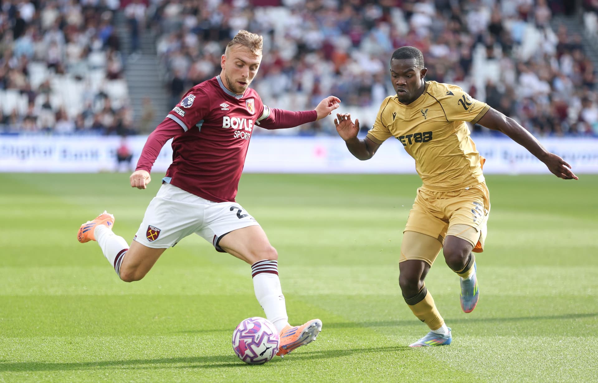 West Ham United's Jarrod Bowen and Crystal Palace's Tyrick Mitchell during the Premier League match